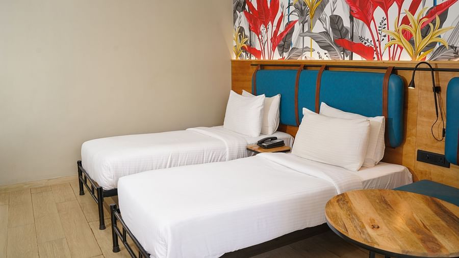 Twin beds in Cozy Twin Room at Indie Stays Resort, Goa.